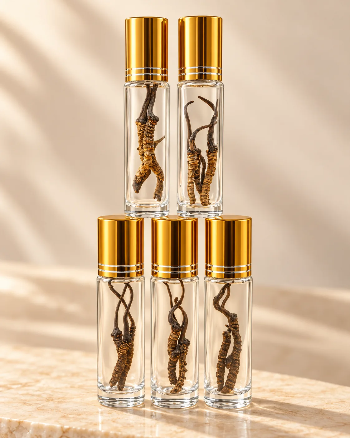 Clear tubes with gold caps containing cordyceps specimens.